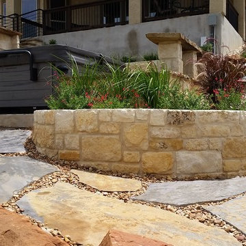 Multi-Level Patio with Hot Tub Water Feature and Boulder Staircase