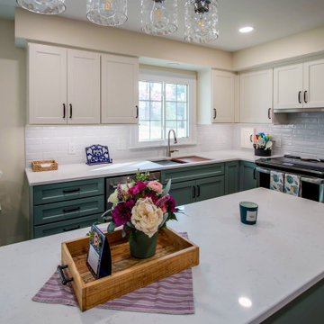 Custom Two-Toned Green and White Kitchen with Laventa Carrara Quartz Countertops