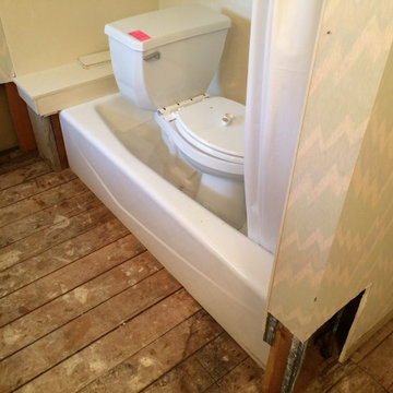 BEFORE PIC - Flood Damaged Floor & Walls, Tub Stays