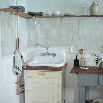 zio + sons masterfully incorporate clé zellige into their charming kitchen space