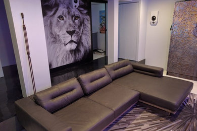 Example of a mid-sized trendy open concept ceramic tile family room design in New York with white walls and no fireplace