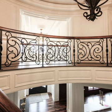 Project #74 | Circular Staircase with Hand-Forged Metal Panels