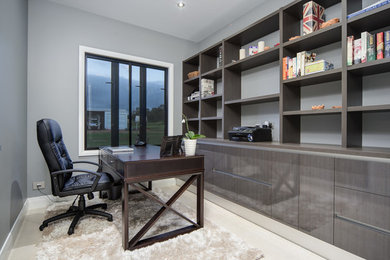Inspiration for a modern home office in Cairns.