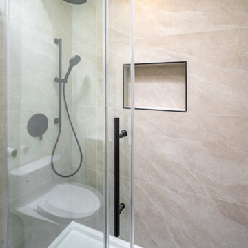 Glass Shower with Large Format Tile and Recessed Niches – Bathroom Renovation Co