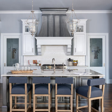 Kitchen with hand painted metallic hood and island