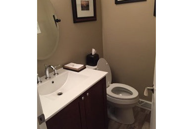 Inspiration for a small timeless powder room remodel in Chicago with a two-piece toilet