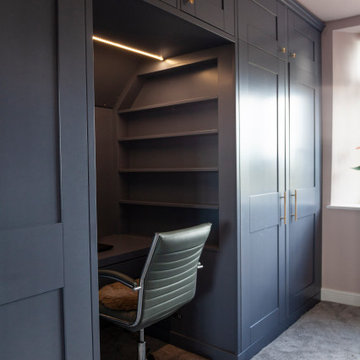 Wardrobe with integrated desk