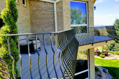 Large metal railing balcony photo in Denver