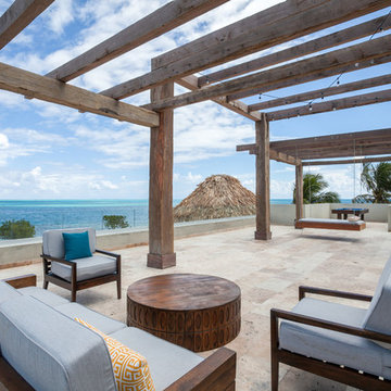 Neutral Sunbrella fabric blends seamlessly for ultimate resort relaxation