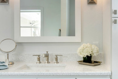 Example of a mid-sized transitional master white tile and subway tile porcelain tile and single-sink bathroom design in Other with shaker cabinets, white cabinets, a one-piece toilet, an undermount sink, quartz countertops and white countertops