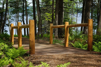 Example of a mountain style home design design in Portland Maine