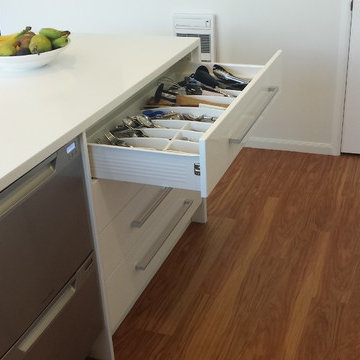 Corian Benchtops with Dezignatek White Gloss cabinetry