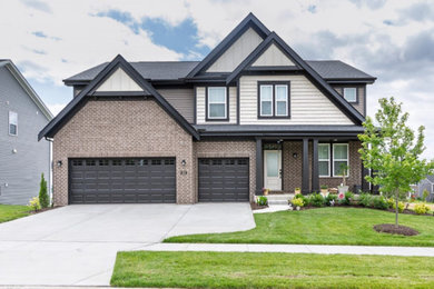 Large minimalist two-story house exterior photo in St Louis
