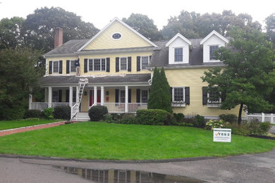 This is an example of a yellow house exterior in Boston.