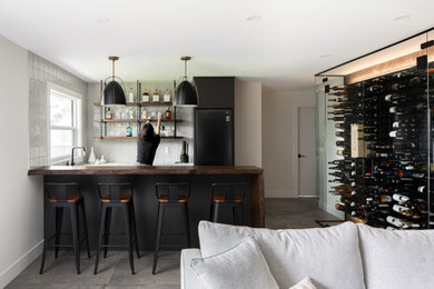 Inspiration for a transitional home bar remodel in Vancouver
