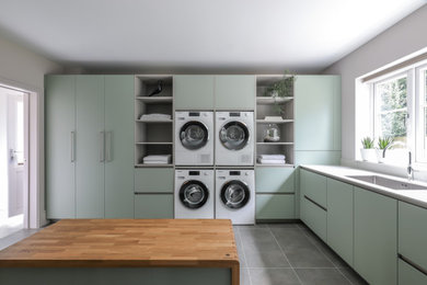 Inspiration for a modern utility room in Sussex.