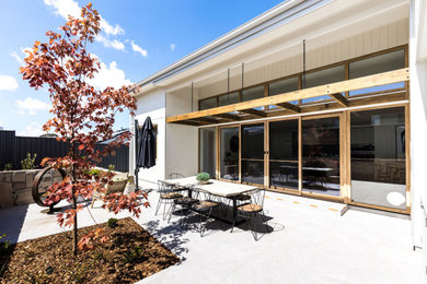 This is an example of a contemporary patio in Canberra - Queanbeyan.