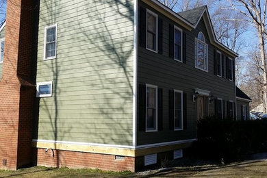 Example of a trendy green two-story mixed siding exterior home design in Richmond