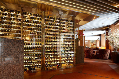 Wine cellar - contemporary wine cellar idea in Montreal