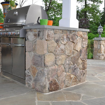 patio,pavilion,outdoor fireplace,indoor fireplace,grill,walkway,walls.