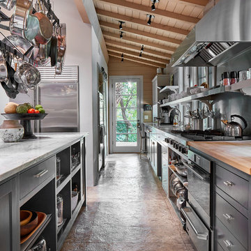Chef's Kitchen with Black Cabinetry and Open Shelving