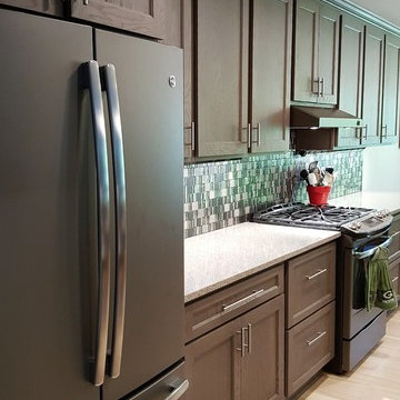 Warm, Grey Stained Oak Kitchen with Modern Accents