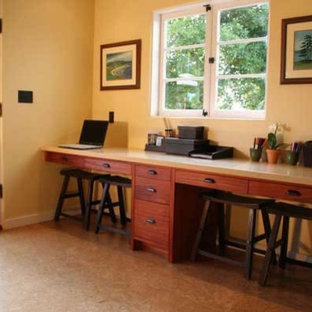 Mid-sized craftsman kitchen pantry appliance - Inspiration for a mid-sized craftsman u-shaped cork floor kitchen pantry remodel in Santa Barbara with a farmhouse sink, recessed-panel cabinets, medium tone wood cabinets, solid surface countertops, multicolored backsplash, ceramic backsplash, stainless steel appliances and an island