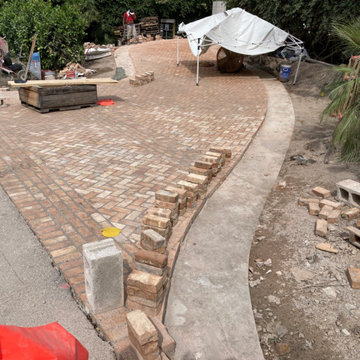 Jupiter Island Chicago Brick driveway with Precast boarders. Stone Faced Home
