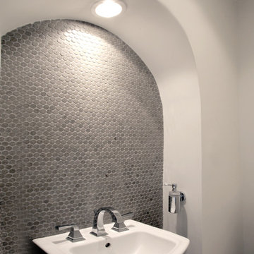 Contemporary Bathroom w/ Penny Stone Backsplash