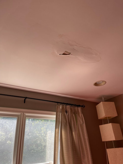 Room ceiling falling after a storm