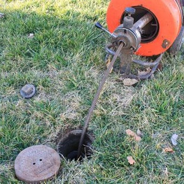 Cleaning out a drain using the proper tools to get the job done quick.