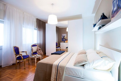 Minimalist bedroom photo in Milan