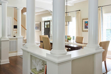 Inspiration for a mid-sized transitional medium tone wood floor and brown floor kitchen/dining room combo remodel in Baltimore with beige walls
