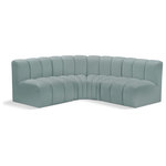 Meridian Furniture - Arc Vegan Leather Upholstered 4-Pc. L-Shaped Modular Sectional, Green - Unleash modern opulence with the Arc Vegan Leather 4pc. Sectional. Crafted for the modern connoisseur, this Sectional injects an air of refined luxury into any space. Its sleek silhouette, upholstered in supple mint green vegan leather, exudes timeless sophistication while the deep channel tufting adds textural intrigue, further elevating the chair's visual appeal. The modular design makes it a versatile chameleon, effortlessly adapting to your evolving needs and preferences. Whether you envision it gracing a chic living room corner, basking in the glow of a bedroom window, or adding a touch of drama to a home office, the Arc seamlessly complements your unique interior aesthetic.
