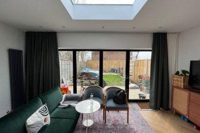 Inspiration for a large modern living room in London.