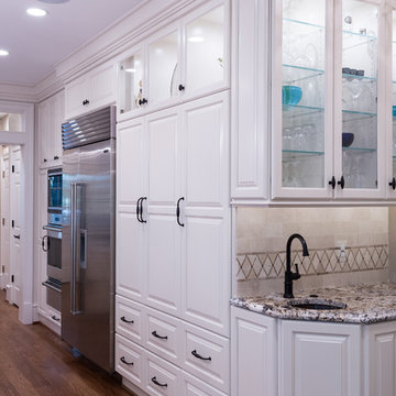 A 48 “ built-in Subzero side-by-side refrigerator/freezer.