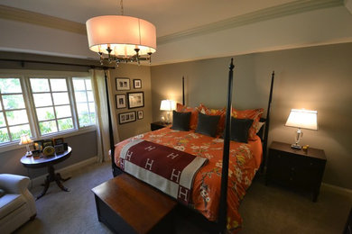 Large elegant master bedroom photo in Chicago with gray walls