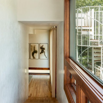 West 9th Hall to Primary Bedroom with Natural Light