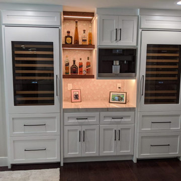 Built-In Wine Wall with Coffee Station and Illuminated Shelving