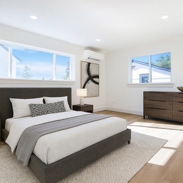 Primary Bedroom with Wide Transom Window and Mini-Split – Snohomish Unit 2