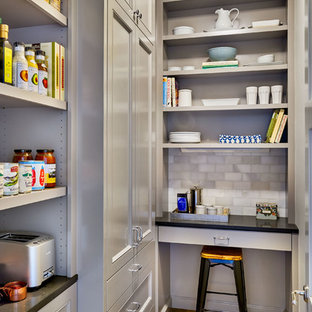 Mid-sized traditional kitchen pantry photos - Inspiration for a mid-sized timeless galley light wood floor kitchen pantry remodel in Portland with gray cabinets, recessed-panel cabinets, quartz countertops, gray backsplash, stone tile backsplash and no island