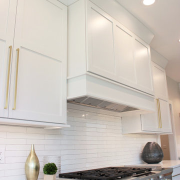 Oak, and White Kitchen with Matte Black Accents in Iowa Aspen Homes Farmhouse
