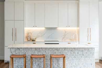 Design ideas for a large contemporary eat-in kitchen in Newcastle - Maitland with a double-bowl sink, white cabinets, marble benchtops, multi-coloured splashback, marble splashback, white appliances, with island and white benchtop.