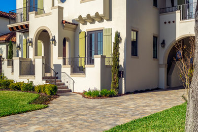 Example of a tuscan exterior home design in Tampa