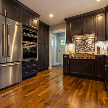 Kitchen with Gray-Stained Cabinetry & Pro Range