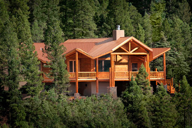 Rustic two-story mixed siding exterior home idea in Albuquerque