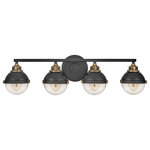 Hinkley Lighting - Fletcher 4-Light Bath Vanity in Black - Fletcher's chic vibe transcends style boundaries. A seamless dome shade features a cast-fitter and an elegant capture ring that secures the clear seedy glass with decorative cast knobs. Spanning vintage to industrial classic to transitional Fletcher seamlessly unifies any decor declaration. Its two-tone finishes come in Polished Nickel with Heritage Brass or Black with Heritage Brass.