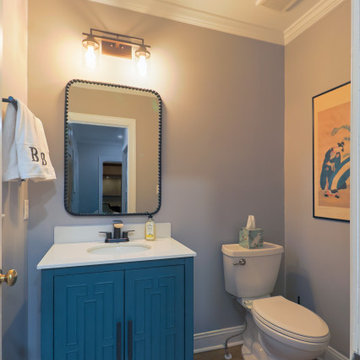 Modern Powder Room Renovation with Bold Blue Vanity