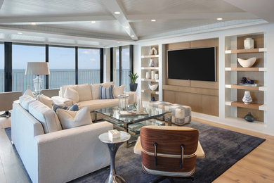 Design ideas for a modern family room in Miami.