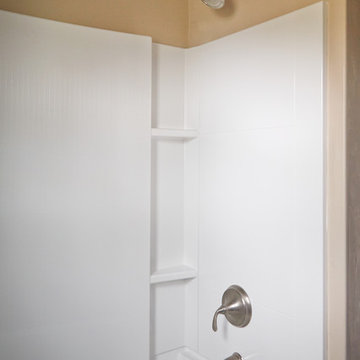 Shower with classic showerhead in brushed nickel